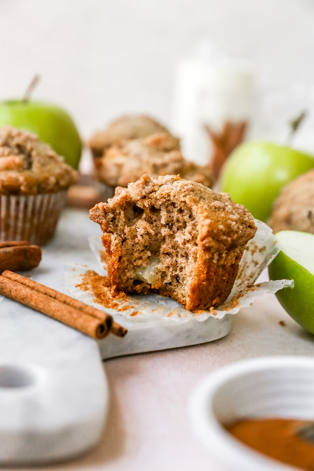bite out of an apple cinnamon muffin.