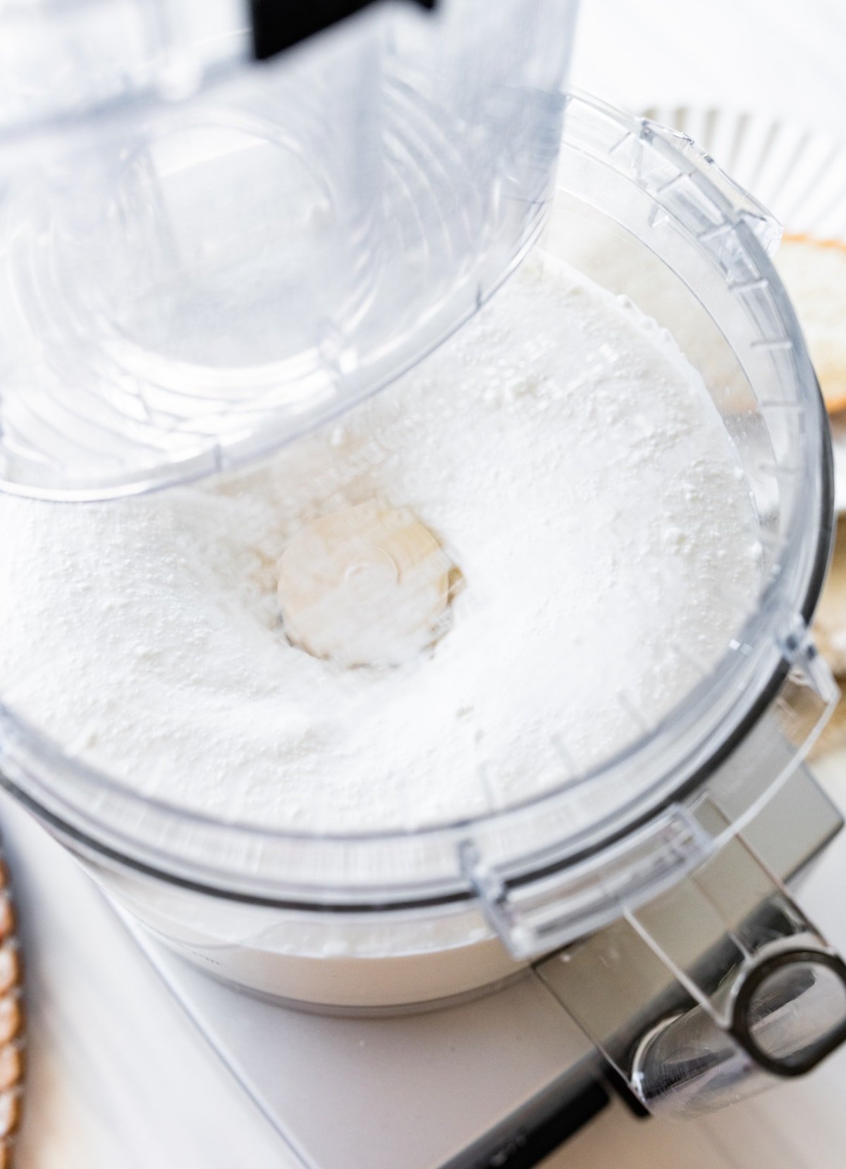 cottage cheese being whipped in food processor. 